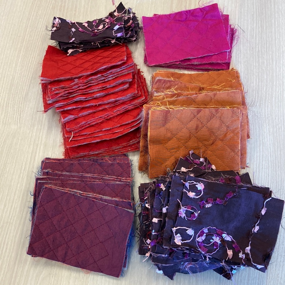 158 cut pieces for quilting or crafts